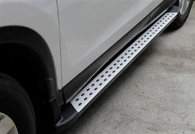 Quina és la funció del pedal lateral del cotxe?